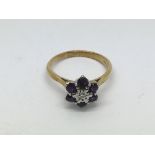 An 18ct gold diamond and treated amethyst ring, approx 4.2g.