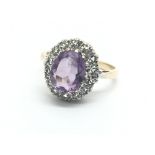 A 9ct gold amethyst and clear spinel ring, approx