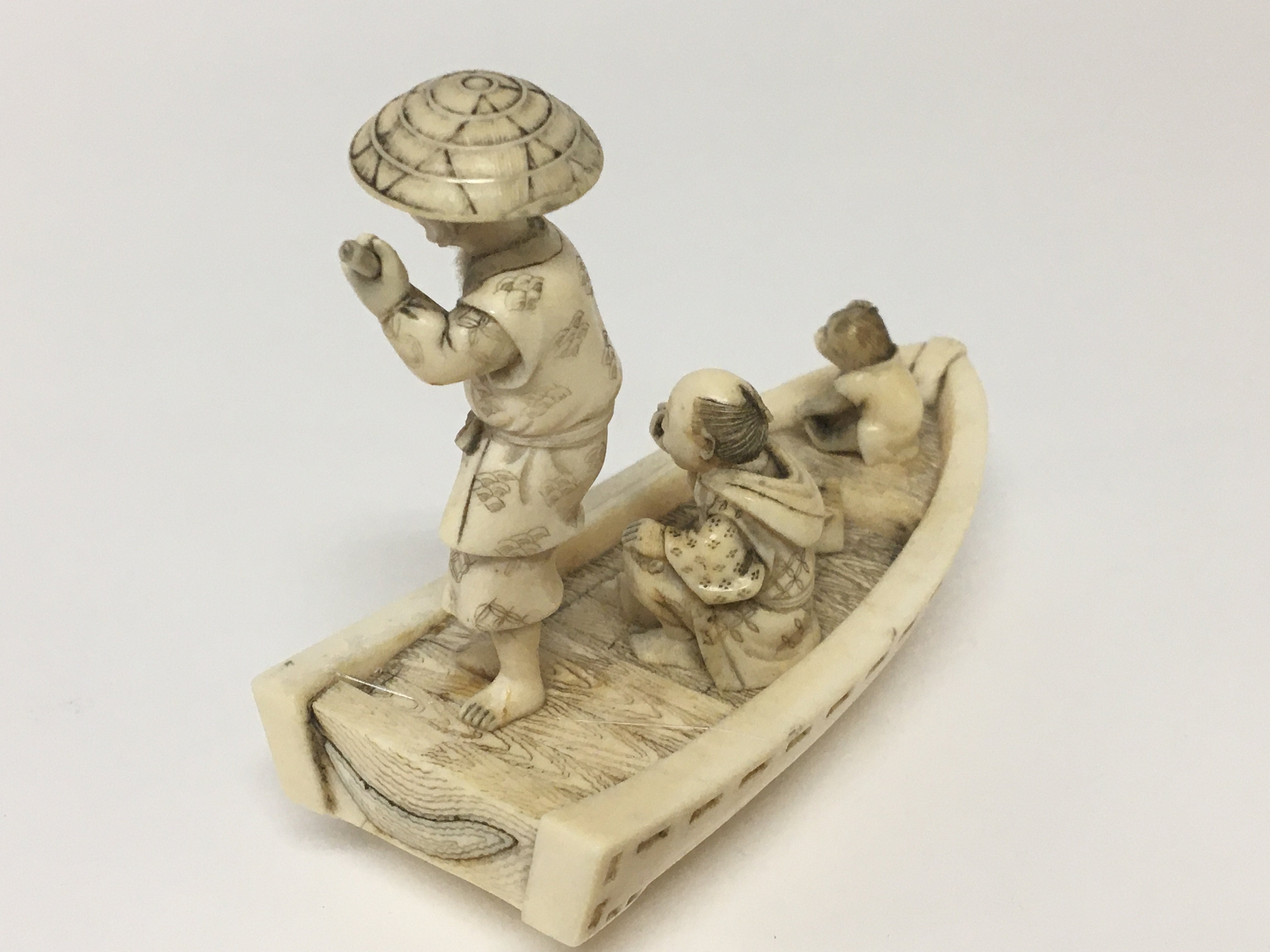 A carved late 19th century ivory carving in the fo - Image 2 of 3