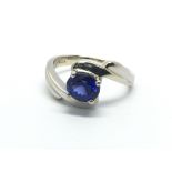 An 18ct white gold tinted sapphire ring, approx 1c