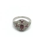 A platinum Victorian style ruby and diamond ring i