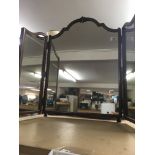 A triple dressing table mirror and a mahogany toilet mirror.