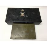 Old military tin with Scottish lowland regiment badge and kings crown and wartime German tin with