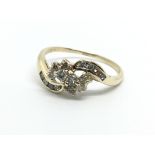 A 9ct gold diamond cluster ring, approx 2g and app