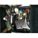 A green leather doctors bag and extensive contents including a medical scope and cased thermometer.