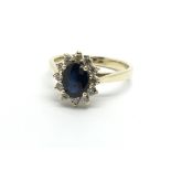 A 9ct gold sapphire and diamond cluster ring, appr