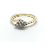 An 18ct gold three stone diamond ring, approx.25ct, approx 3.2g and approx size K-L.