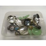 A collection of various tea caddy spoons.