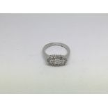 An 18ct white gold diamond 'boat' cluster ring set