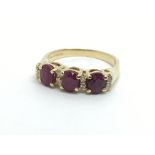 An 18ct gold ruby and diamond ring, approx 3.9g an