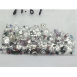 A bag of mixed loose stones including cubic zircon