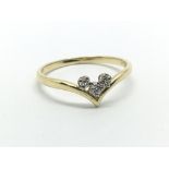 An 18ct gold three stone diamond ring, approx.12ct, approx 1.7g and approx size N.