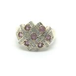 A 9ct gold pink sapphire and diamond cluster ring,