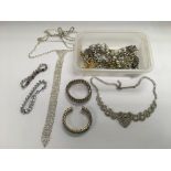 A collection of diamonte jewellery including brace