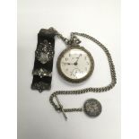 A German made early 20th Century alarm pocket watch with attached silver Albert chain and fob.