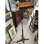A Victorian mahogany and brass music stand maker North of Birmingham.with adjustable brass