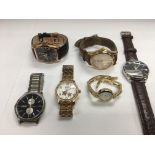A bag of six assorted watches.