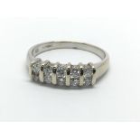 An 18ct white gold ring set with two rows of diamo