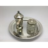 A silver tray, approx width 13.5cm together with a silver pepperette and a silver topped glass