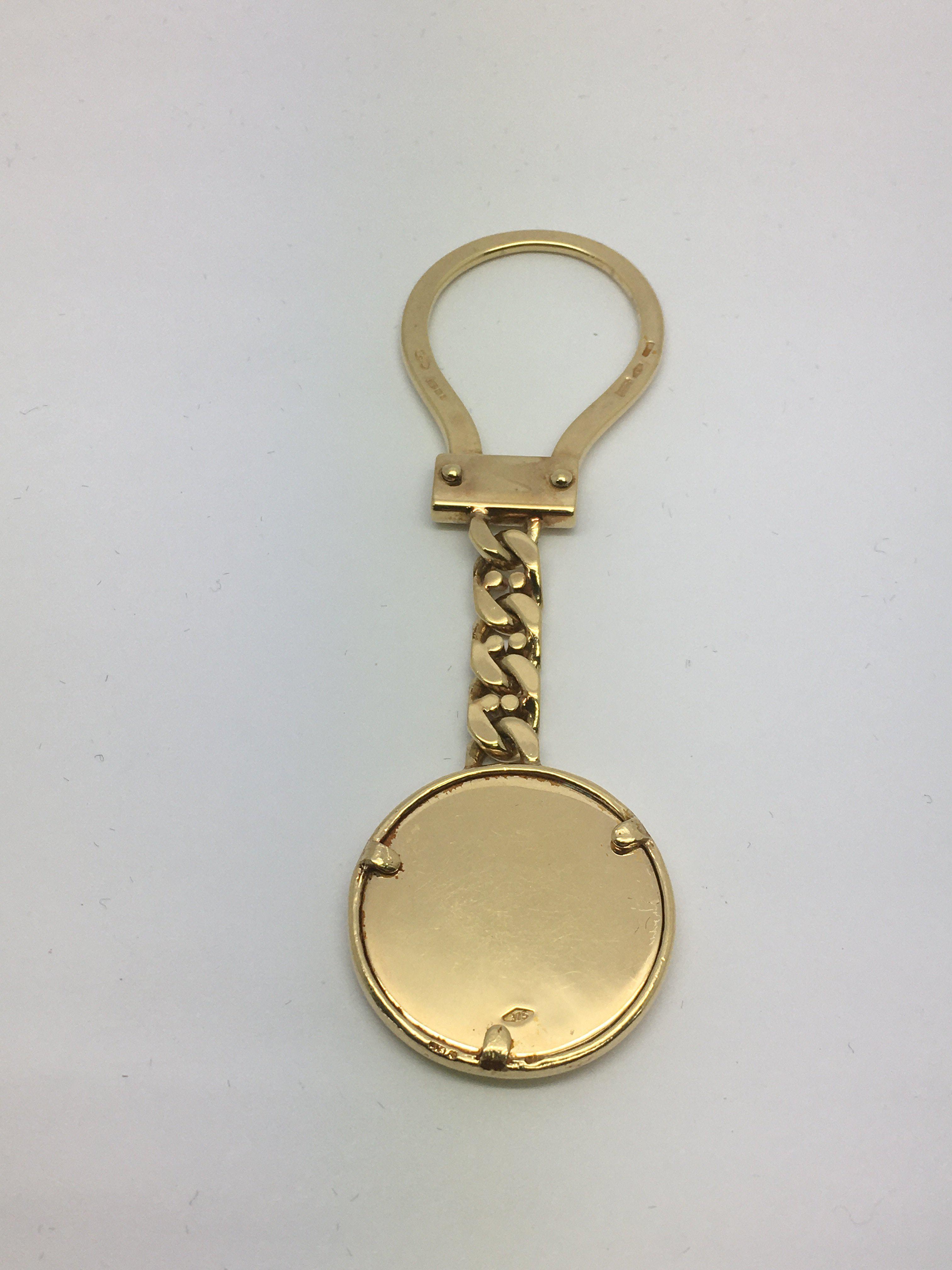 A 9ct gold Mercedes key ring, approx 14.7g. - Image 2 of 2