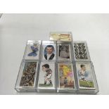 A collection of 9 sets of cigarette cards including Ogdens “ Football Charicatures “ and