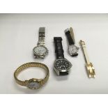 Five watches comprising Pulsar, Citizen, Gucci etc