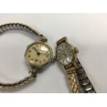 A 9 ct gold ladies wrist watch with gold plated st