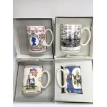 Four boxed Wedgwood commemorative pint mugs.