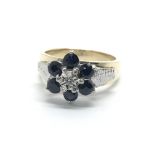 A 9ct gold sapphire and diamond cluster ring, appr