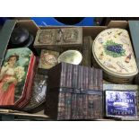 A collection of 7 boxes containing various tins in