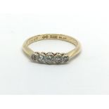 An 18ct gold and platinum five stone diamond ring,