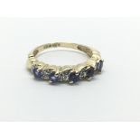 A 9ct gold sapphire and diamond ring, approx 1.9g and approx size J.