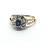 An 18ct yellow gold sapphire and diamond cluster r