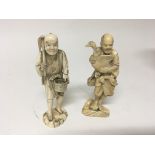 Two late 19th century Japanese carved ivory figure