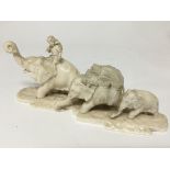 A Quality late 19th century ivory carving of three graduating elephants one surmounted with an
