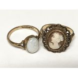 Two 9carat gold rings one set with a cameo the other with an opal (2)