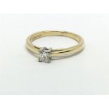 An 18ct yellow gold and princess cut diamond ring,