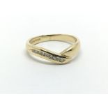 An 18ct gold nine stone diamond ring, approx .10ct, approx 3.3g and approx size K-L.