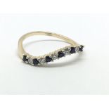 A 14ct gold sapphire and diamond half eternity twist ring, approx 2g and approx size O-P.