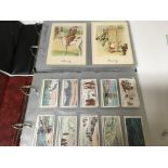 2 albums of cigarette cards