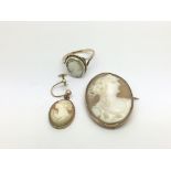 Three 9ct gold cameo items comprising a ring, broo