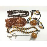 A collection of amber necklaces.