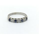 An 18ct yellow gold sapphire and diamond eternity