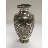 A Persian silver vase, approx height 10.5cm, approx 127g.
