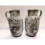 A pair of late Victorian hand painted glass jugs depicting birds, approx 20.5cm.