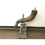 A large impressive cow horn table snuff mull with brass fittings And on a silver plated stand with