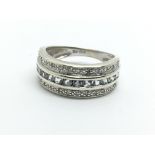 A 9ct white gold set with three rows of diamonds a