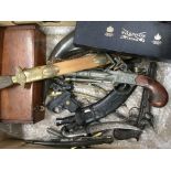 A box containing a collection of replica guns Pers