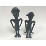 A pair of 20th century possibly Oceanic bronze fig