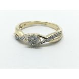 A 9ct yellow gold and diamond cluster ring, approx